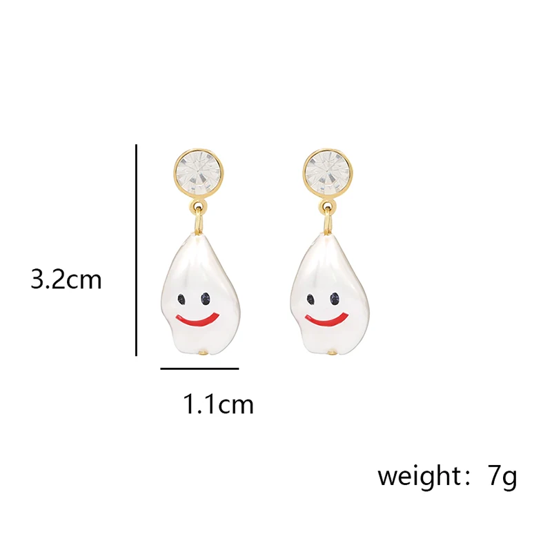 A faux Baroque pearl smile face earrings